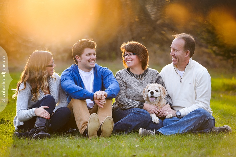 Family portraits with their dog in Ottawa photographed by Liz Bradley of elizabeth&jane photography